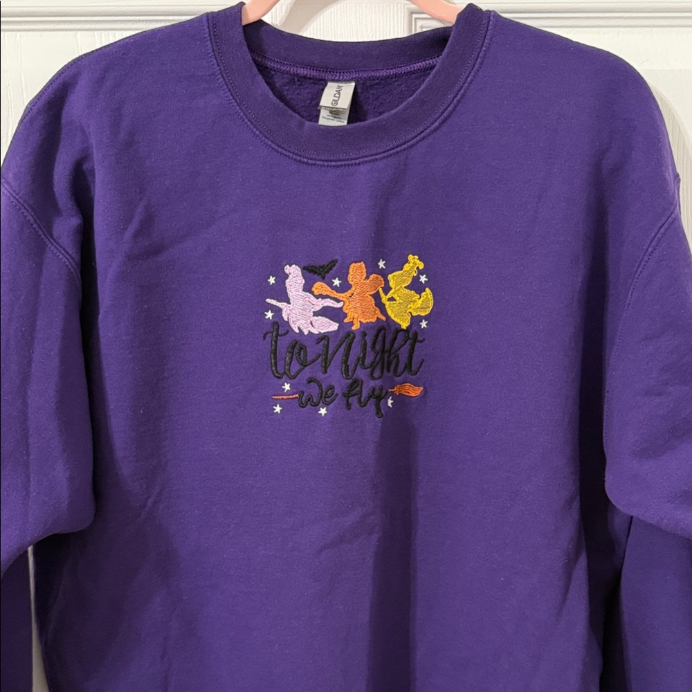 Purple Sweatshirt with Fun Witch Design